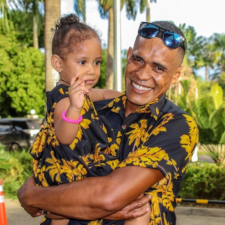 Kaveri Mehta, Lead Design Curator at Adaptive System Network, reviewing corporate floral arrangements
